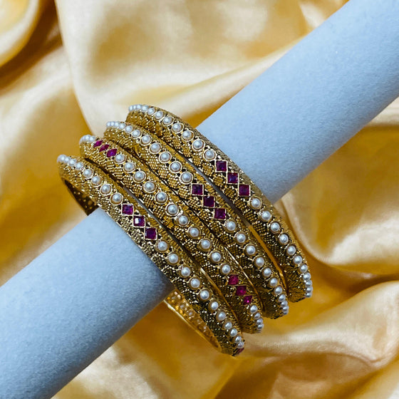 GOLDEN BANGLES