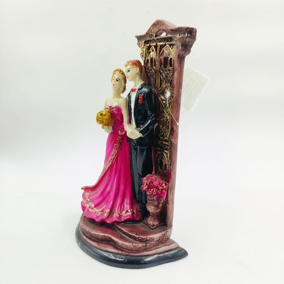 COUPLE WITH SHOW PIECE